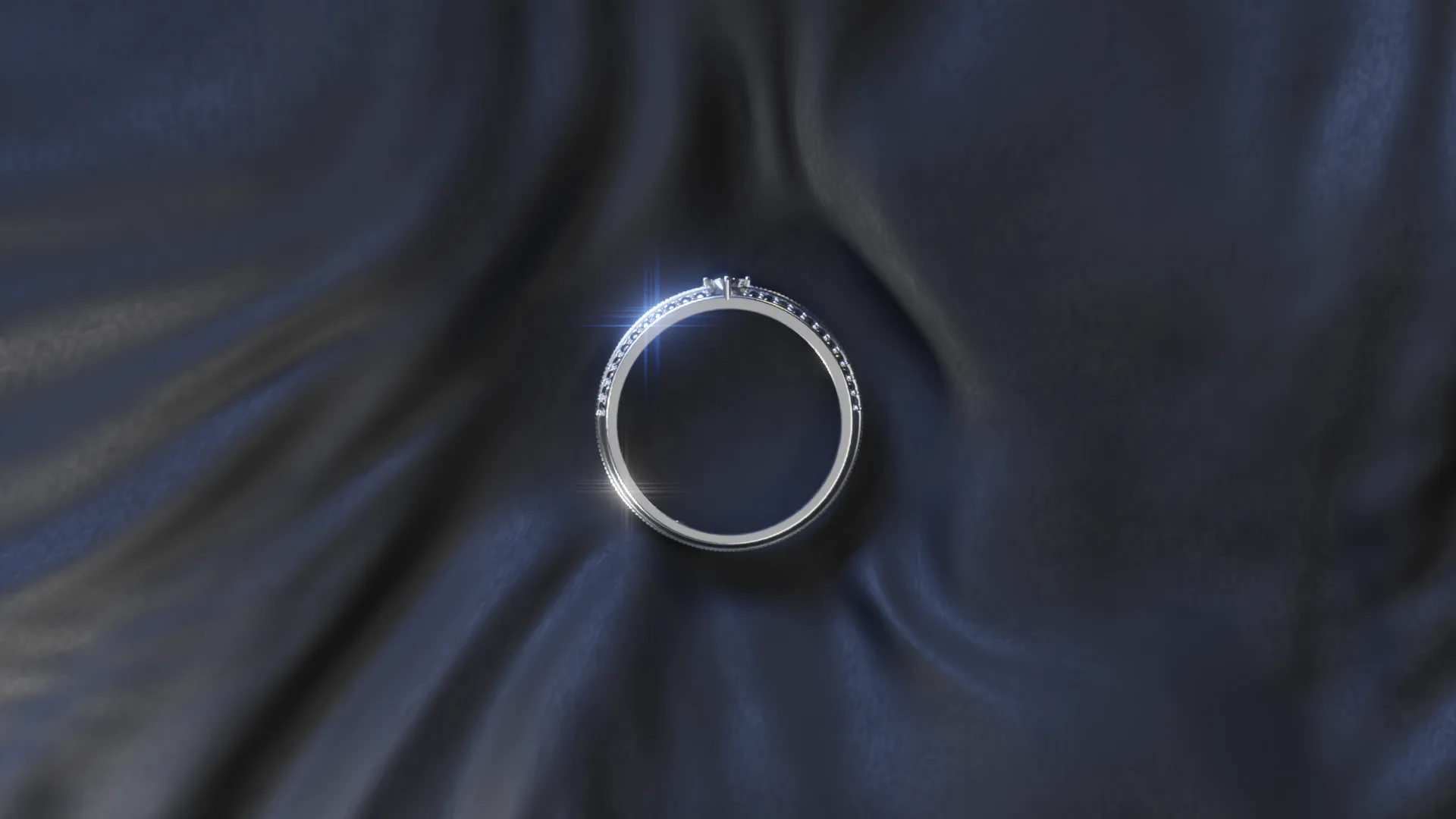 A ring on folded blue satin