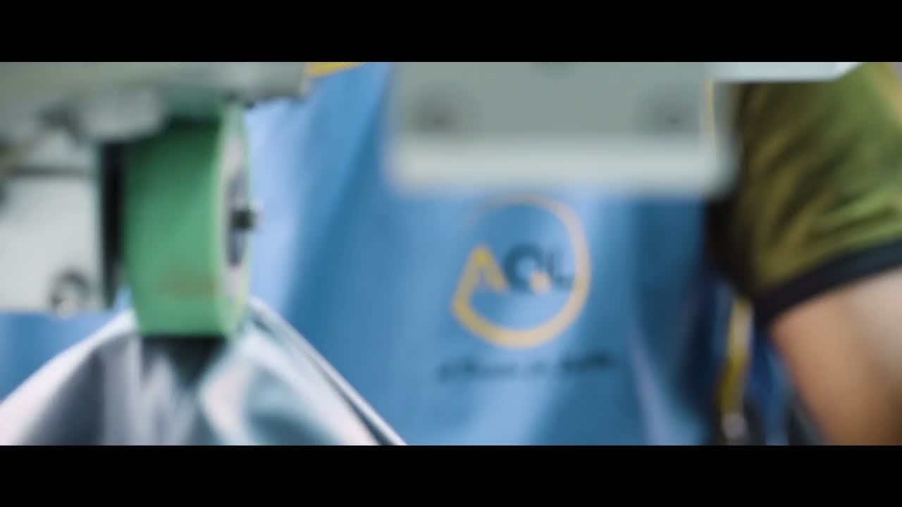 Still frame from the video: AQL Factory Trailer